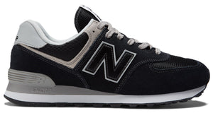 Black athletic shoe with gray accents, featuring a prominent 'N' logo on the side.