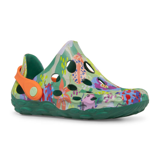 A green clog with floral print and orange adjustable strap.