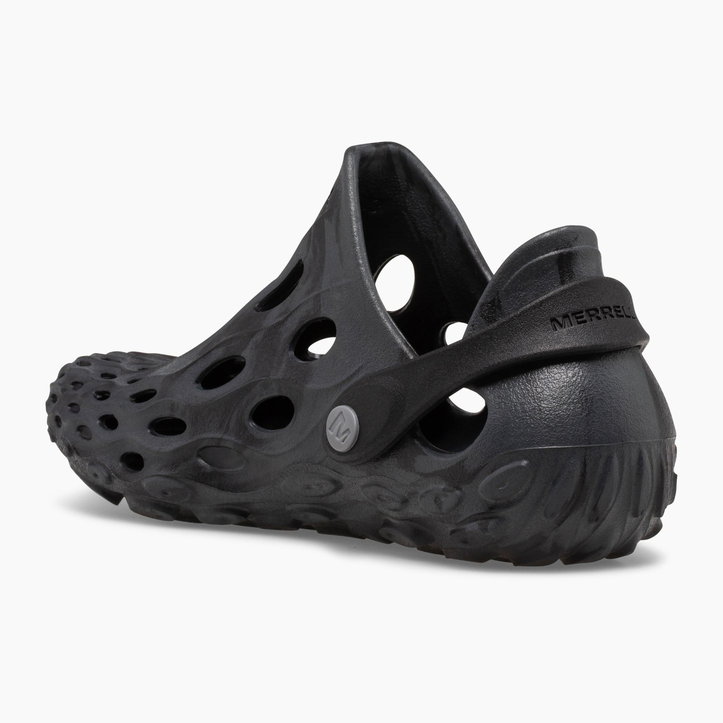 Black textured slip-on shoe with heel strap and multiple holes.