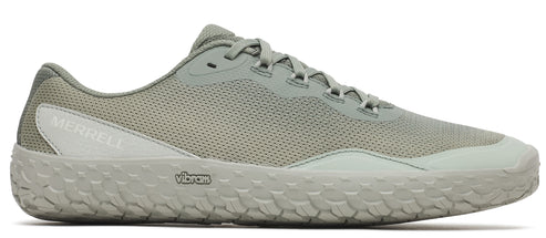 A shoe with a flat, textured sole and a gray mesh upper. The word "MERRELL" is visible on the side of the shoe.