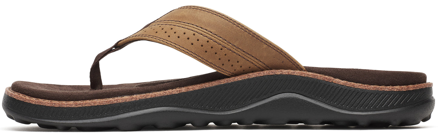A tan-colored sandal with a brown sole.