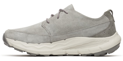 A gray suede shoe with a thick white sole and gray laces.