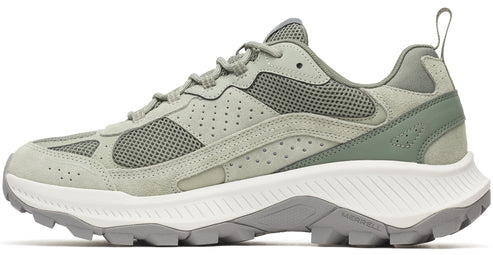 A sage green suede sneaker with white jagged midsoles and grey outsoles.