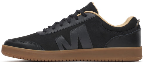 A low-top sneaker with a black upper and a brown sole.