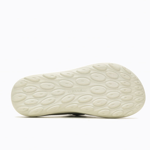 Sole of a sandal with circular pattern and "MERRELL" text in the center.