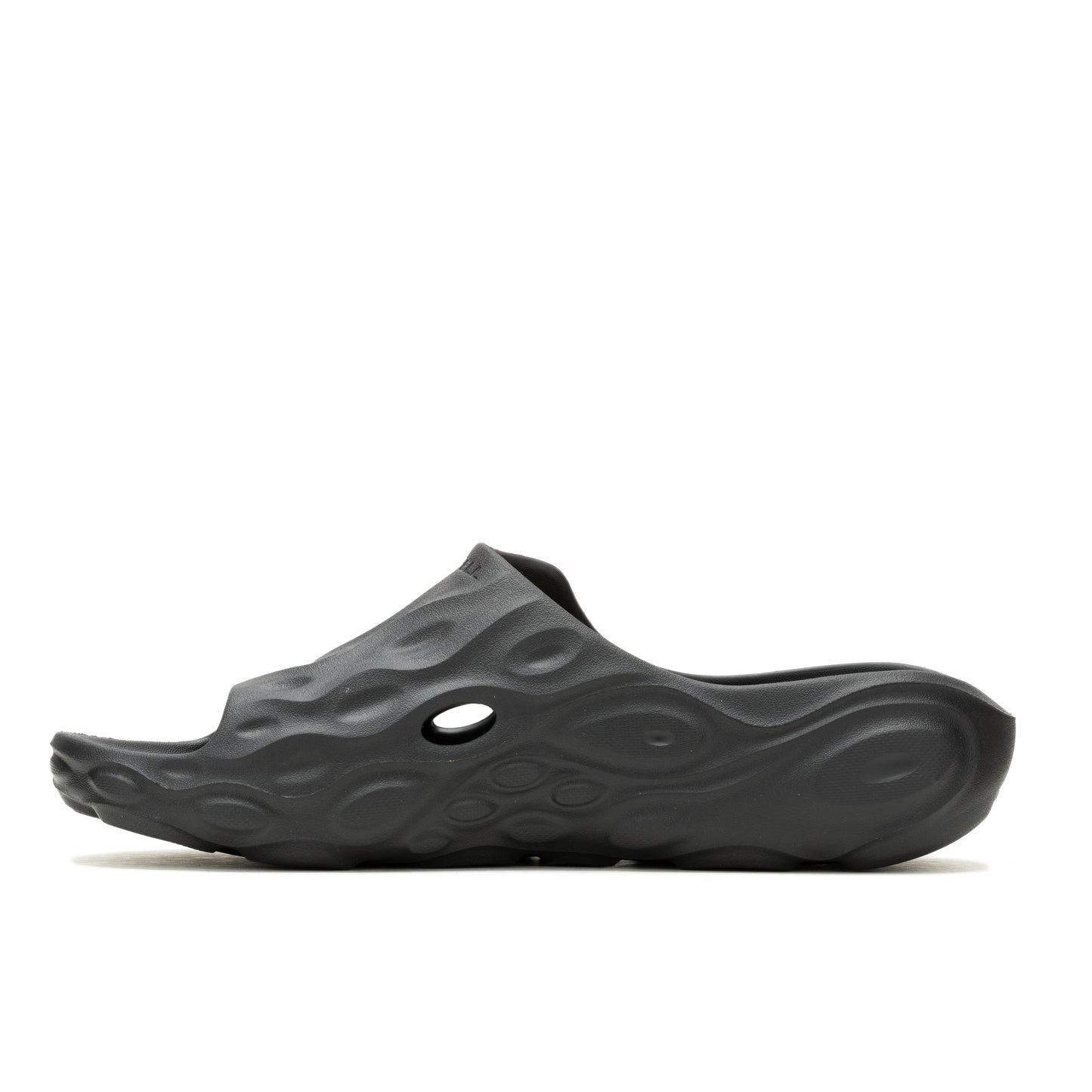A dark gray, textured slip-on sandal with a rounded toe.