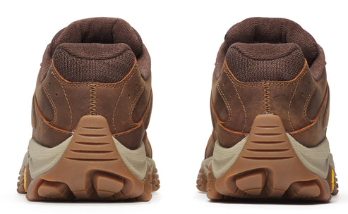 Back view of brown leather walking shoes with thick, lugged soles.