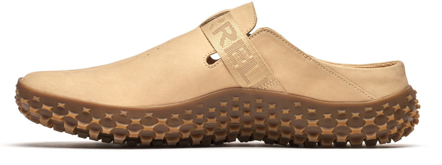 Tan shoe with 'MERRELL' strap and nubbed sole.