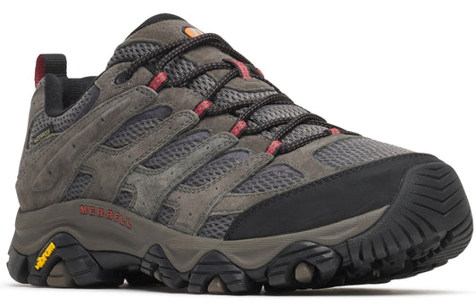 A gray and black hiking sneaker with mesh and suede upper, dark gray laces, red accents, a rugged black rubber sole with yellow Vibram branding on the side, and the Merrell logo printed in red on the midsole.