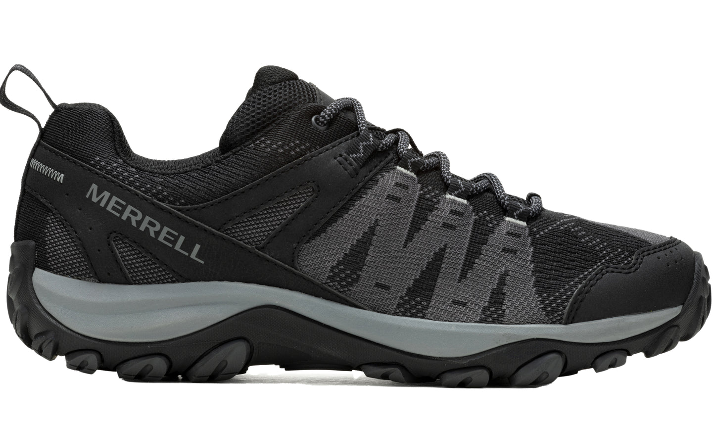 Black athletic shoe with gray accents and loop on heel.