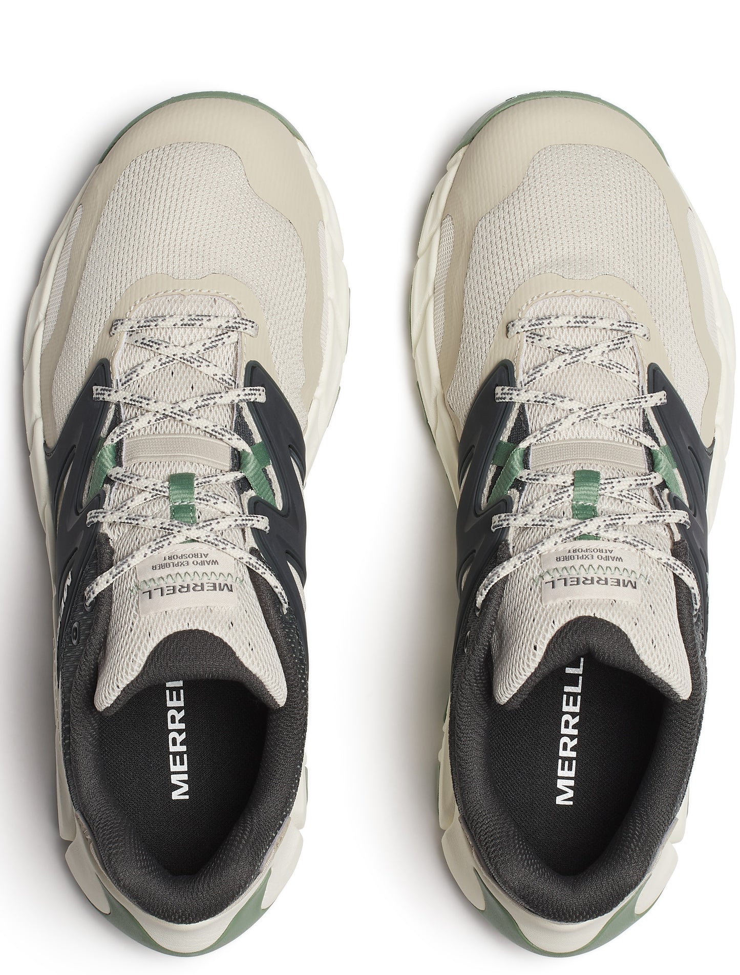 Top-down view of two off-white sneakers with black and green accents and white and gray laces; "MERRELL" printed on insole.