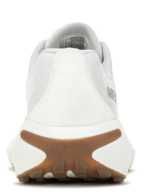 Rear view of white athletic shoe with a brown accent on the sole.