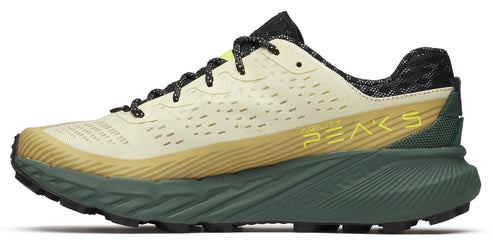A running shoe with tan upper, yellow "ABILITY PEAKS" text on the side, green midsole, and black sole.