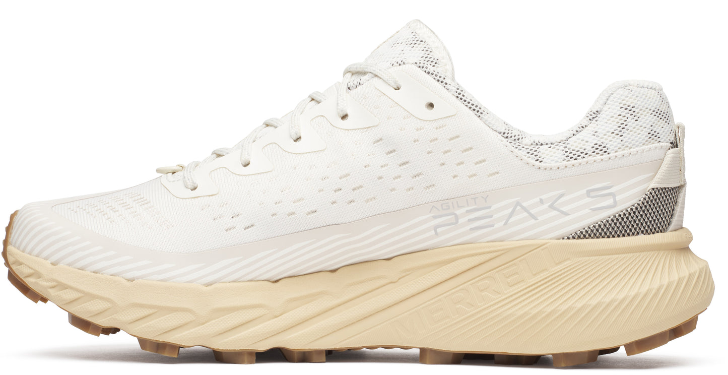 Beige trail running shoe with a cream sole and textured mesh.