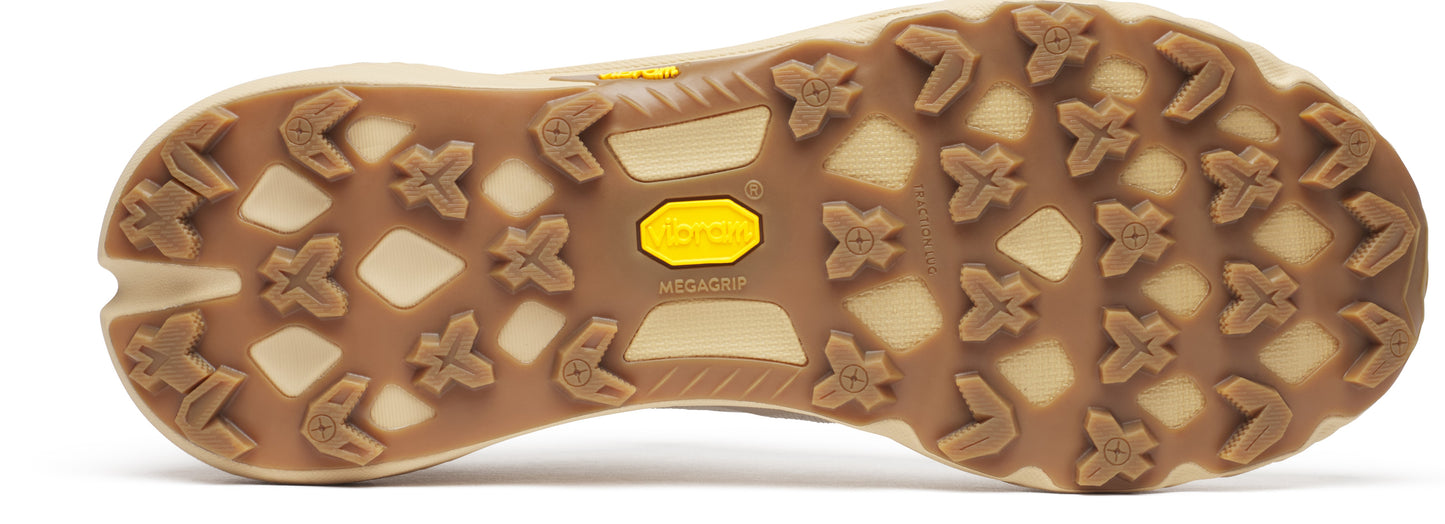Bottom view of a shoe sole with a tan and brown color scheme and deep treads.
