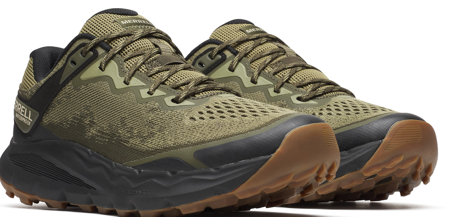 A pair of olive green running shoes with a brown sole.