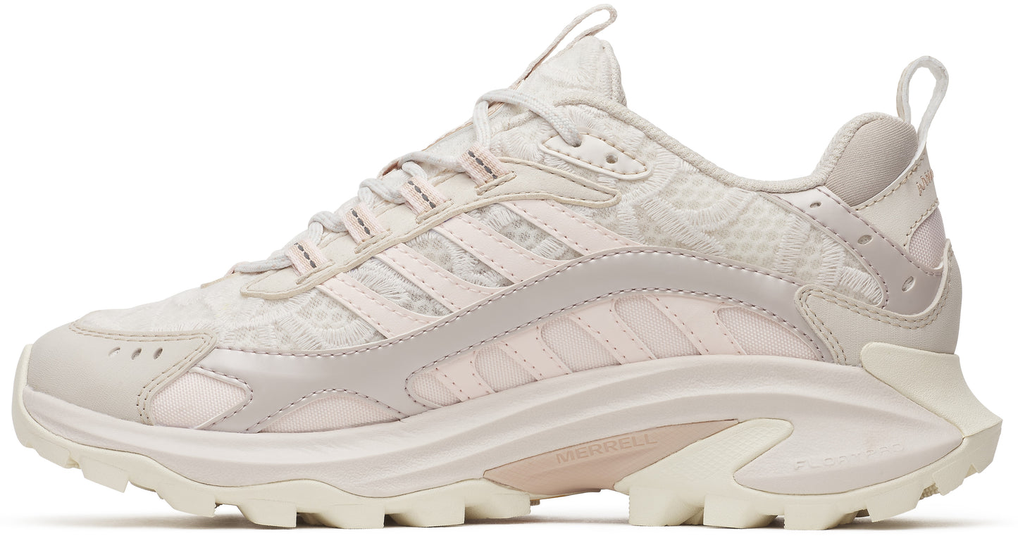 Beige athletic shoe with a layered upper, three stripes, and a sculpted outsole.