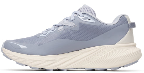 A light blue running shoe with a thick, cream-colored sole.