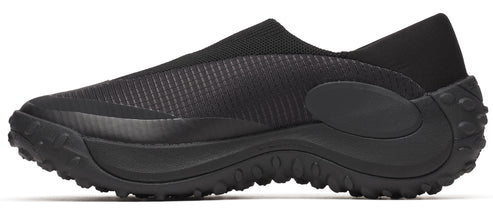 Black slip-on shoe with a thick treaded sole.