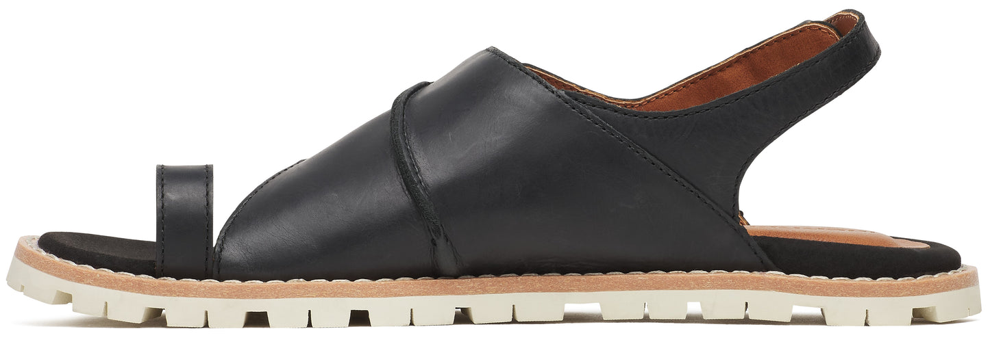 A black leather toe loop sandal with a white sole.