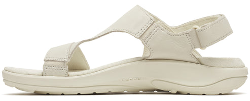 A sandal with a white color, featuring a T-strap design and velcro closure.