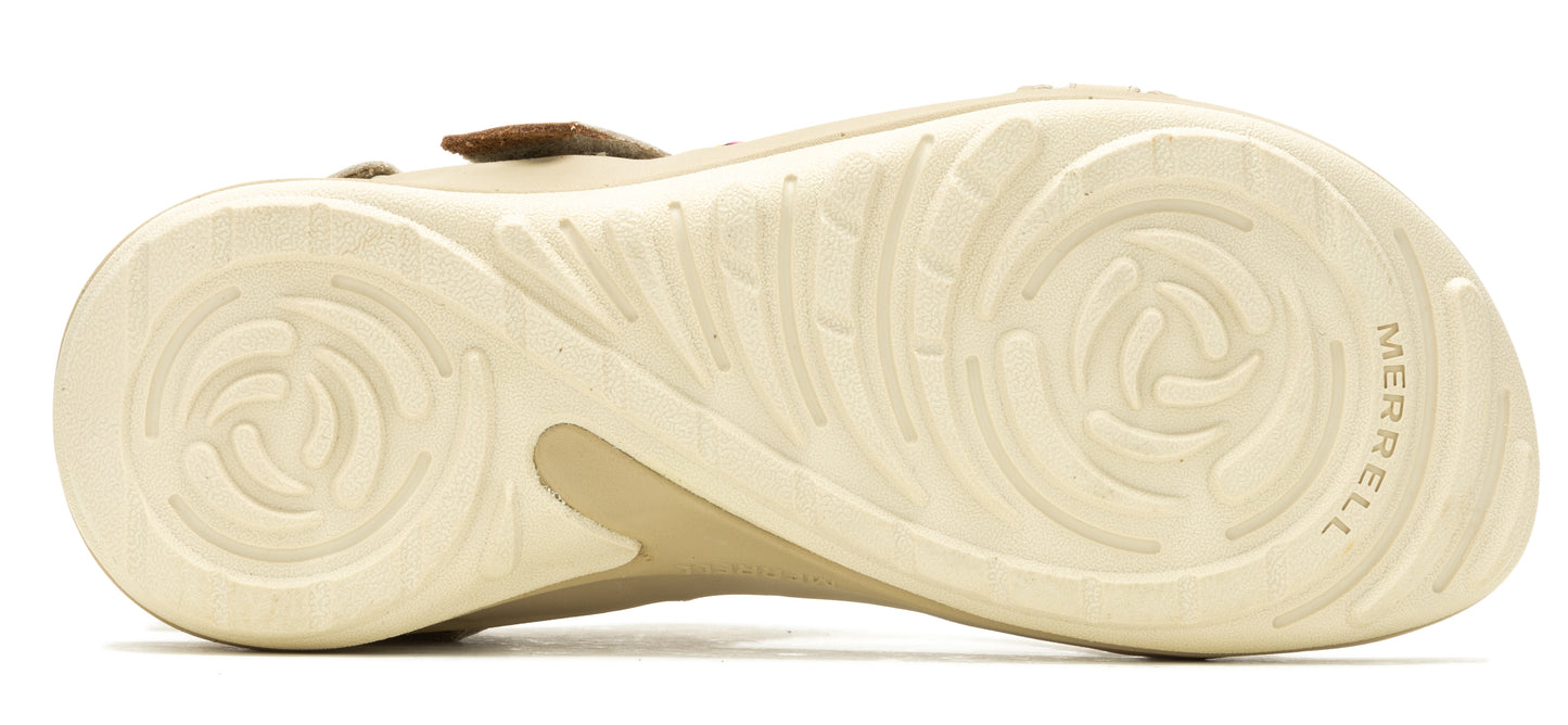 A shoe's sole featuring a spiral pattern and 'MERRELL' written on it.