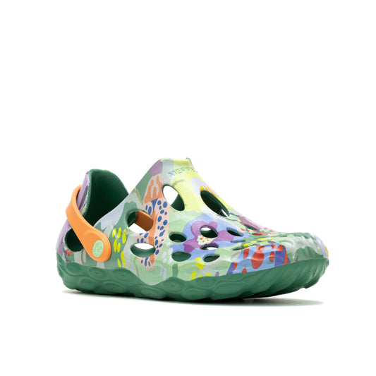 Multicolored clog with cutouts and orange back strap on a green sole.