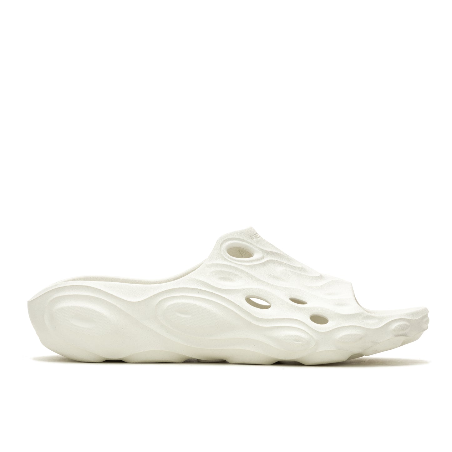 Off-white, textured foam slip-on shoe with holes.