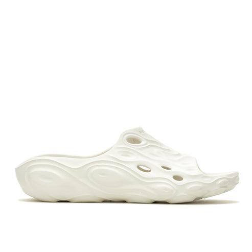 Off-white, textured foam slip-on shoe with holes.