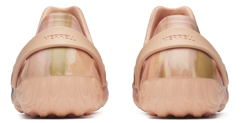 Pair of salmon colored slip-on shoes with a rounded toe and strap across the back.