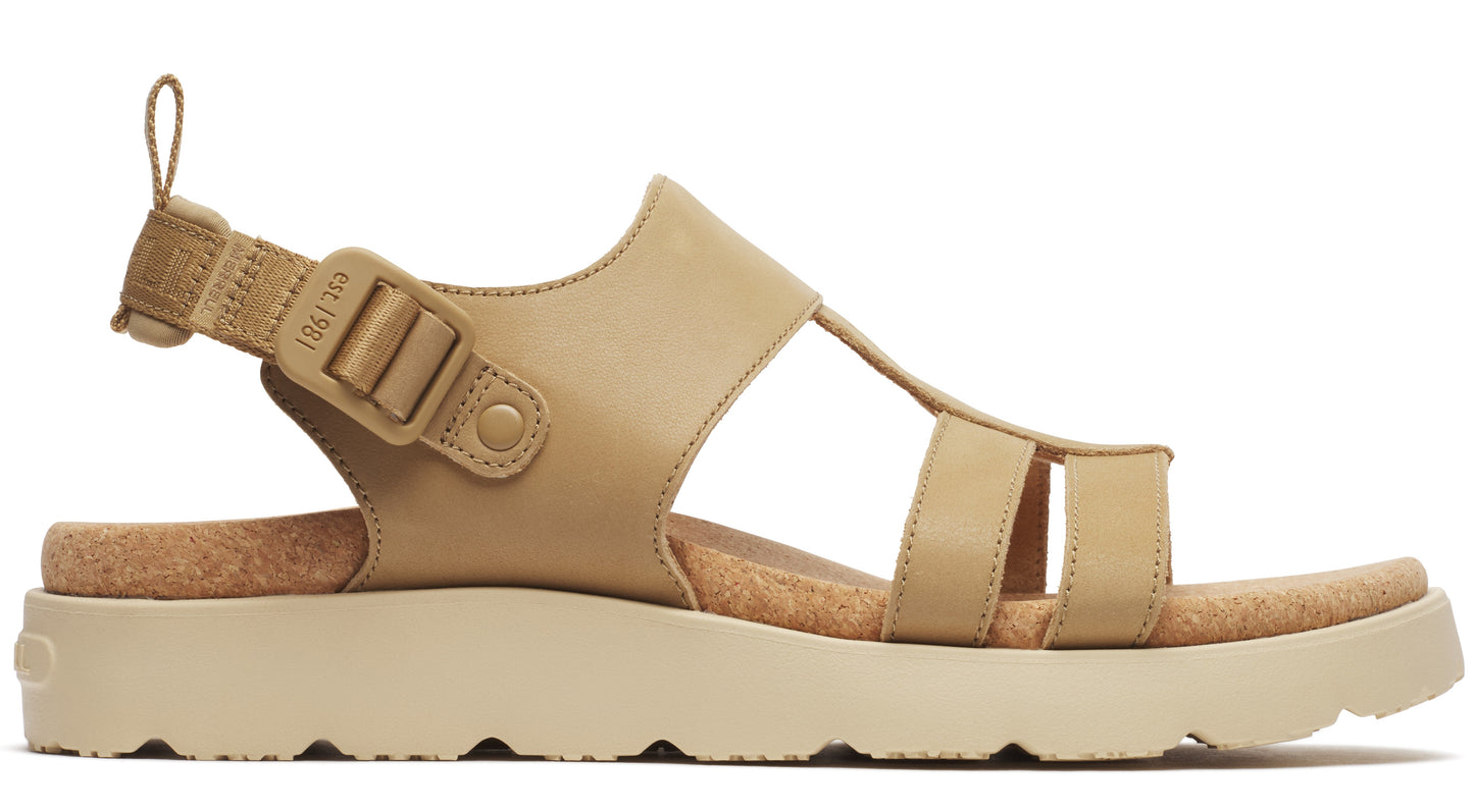 Tan-colored sandal with adjustable back strap and thick cork sole.