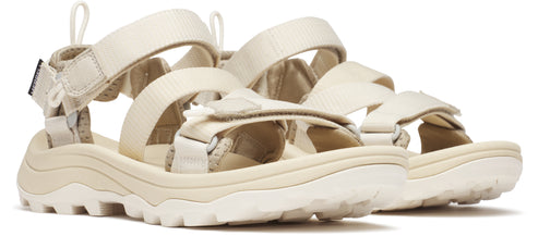 Beige platform sandals with hook and loop straps.