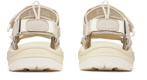 Two identical sandals with velcro straps, adjustable bungee cords, and thick soles, seen from the rear.