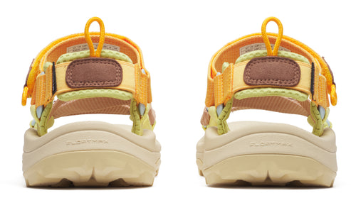 Rear view of two yellow adjustable sandals with beige soles and 'FLOATMAX' text.