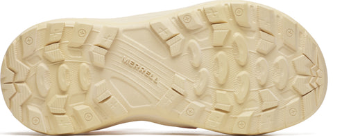 The sole of a shoe with a pattern of ridges and circles with the word "Merrell" on it.