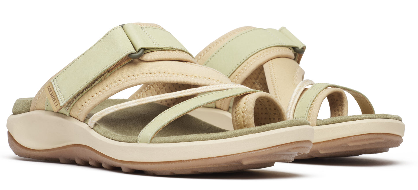 pair of light colored sandals with several straps