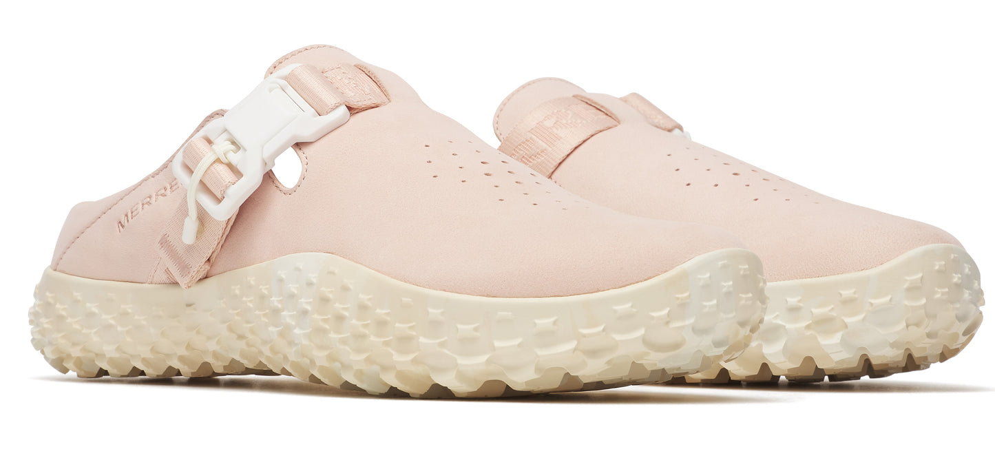 A pair of pink shoes with thick, textured soles and an adjustable strap.