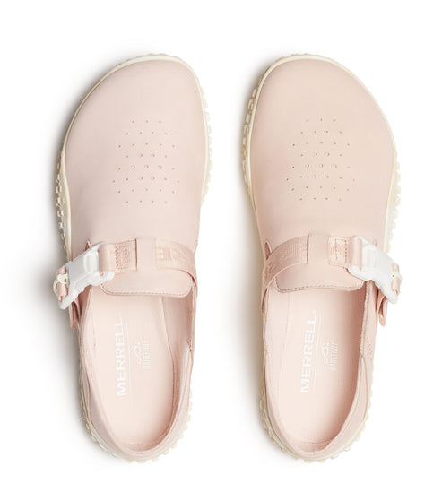 Pair of light pink clogs with a strap and buckle, featuring small perforations on top and the word "MERRELL" visible inside.