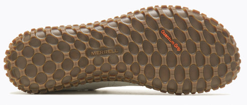 Shoe outsole with round grid pattern and "MERRELL" and "Quantum Grip" text.