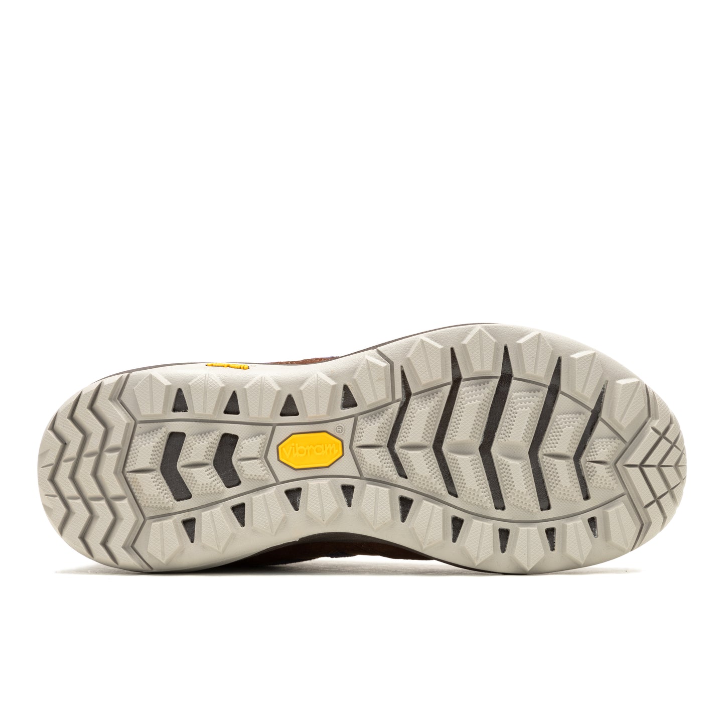 Bottom view of a shoe featuring an outsole with a complex pattern of ridges and lugs for traction, with a yellow Vibram logo in the center.