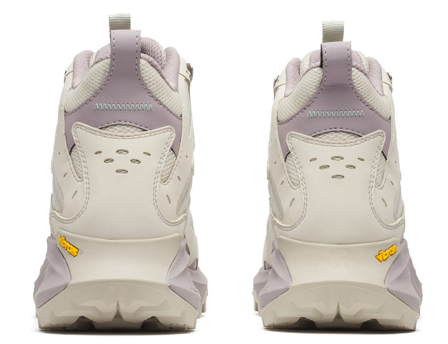 Two light beige hiking boots, seen from the back, with purple accents and thick, yellow Vibram soles.