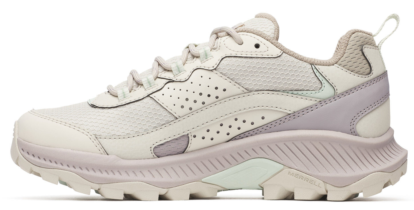 Off-white low-rise trail running shoe with a lavender accent.