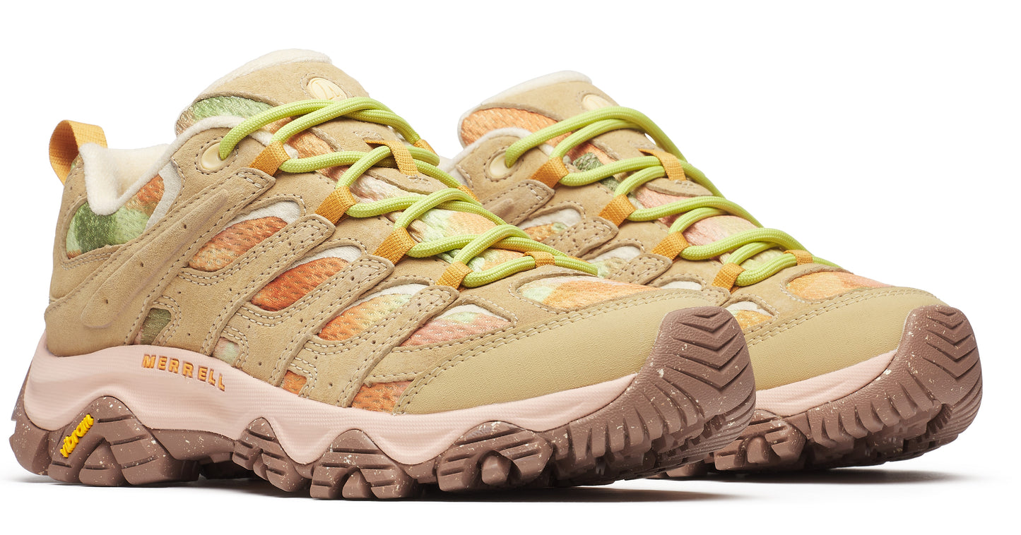 Beige trail running shoes with floral patterned mesh, chartreuse laces, and pink soles.