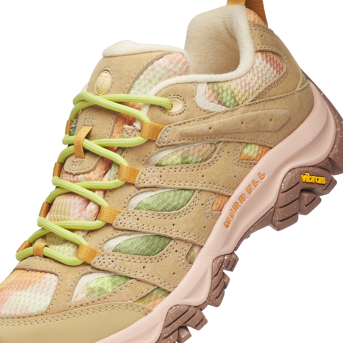 Tan hiking shoe with neon green laces and orange trim. Vibram sole and 'Merrell' text visible.