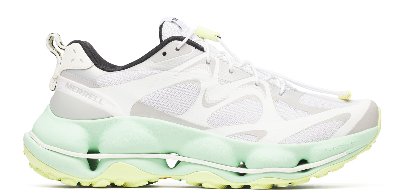 A white athletic shoe with a light green sole.