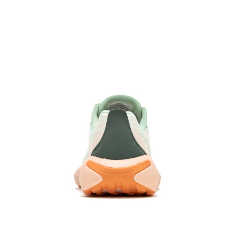 Trail running shoe's rear view: white and light green upper, dark green heel, peach-colored midsole and outsole.