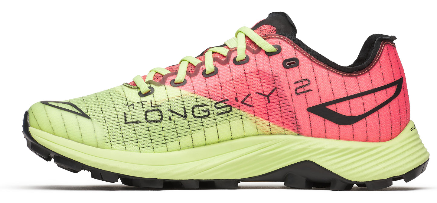 A running shoe in light green and pink with black accents.