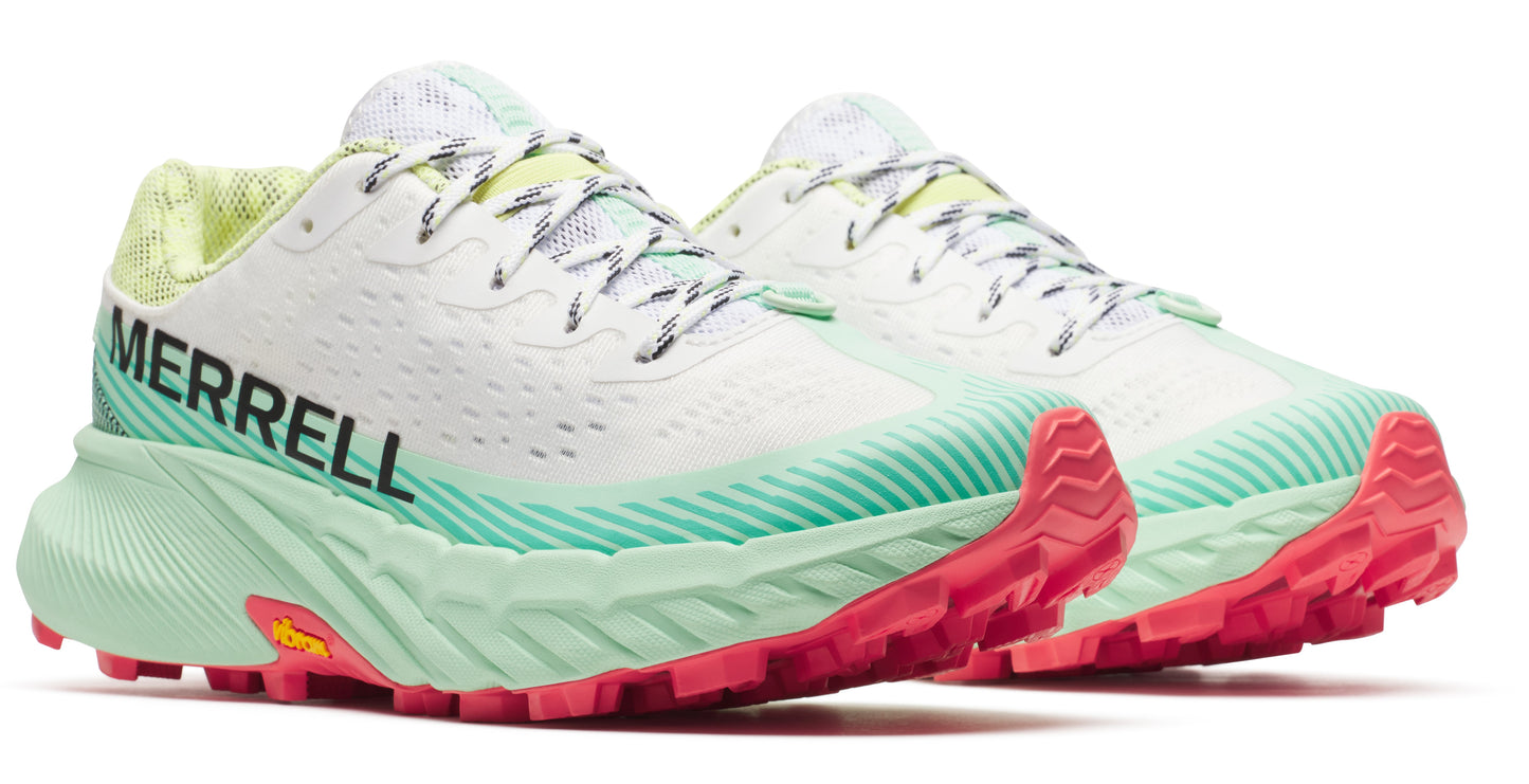 Trail running shoes with white mesh upper, green sole, and pink treads; "MERRELL" visible on the side.