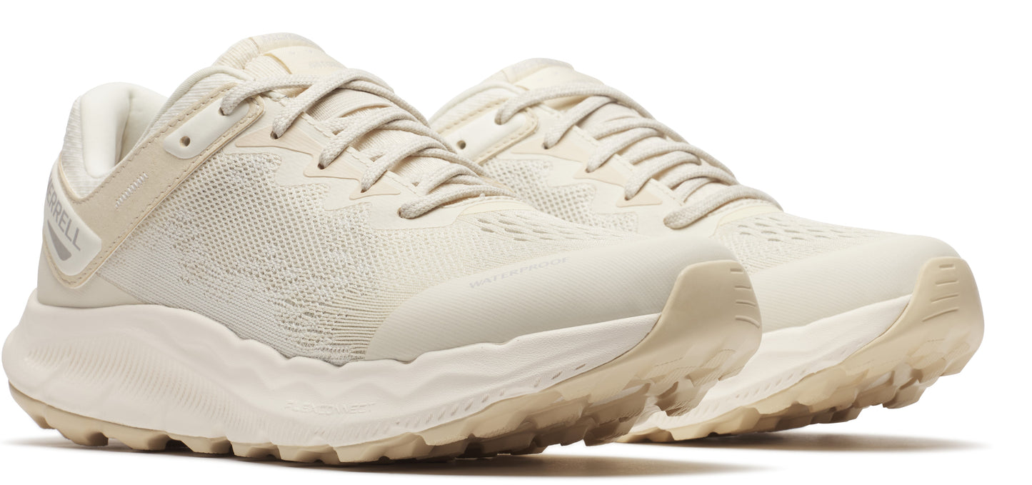 Pair of running shoes in a light tan color, featuring a mesh upper, lace-up closure, and a thick, textured sole.