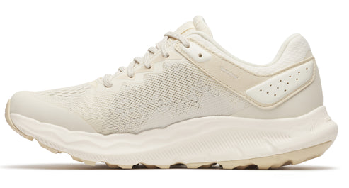 Beige running shoe, side view, with textured sole and perforated heel.